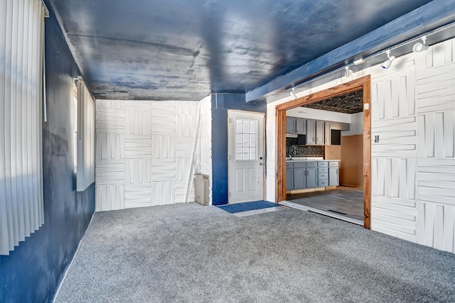 unfurnished room featuring carpet flooring