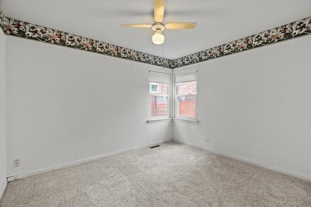 6449 W 84th St, Burbank, IL 60459 - spare room featuring carpet flooring and a ceiling fan