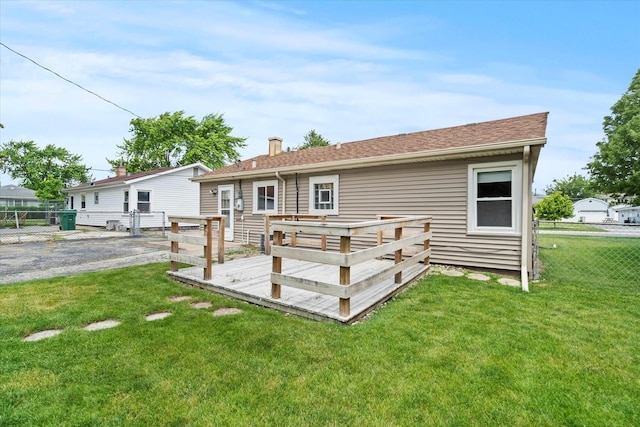 6449 W 84th St, Burbank, IL 60459 - rear view of house with a wooden deck and a chimney