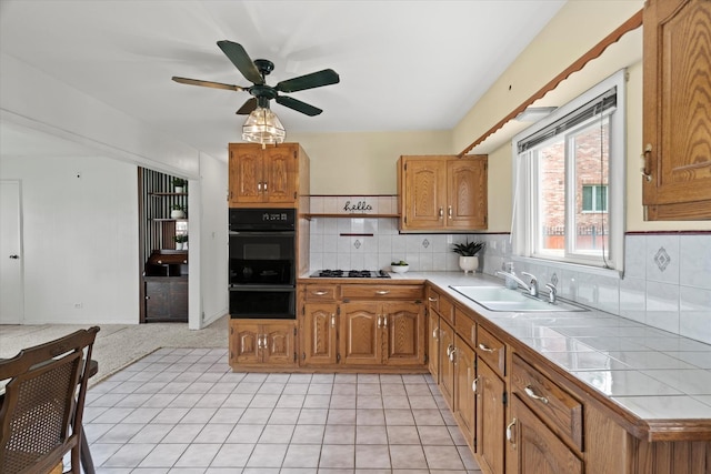 6449 W 84th St, Burbank, IL 60459 - kitchen featuring black oven, gas cooktop, a warming drawer, tile countertops, and ceiling fan