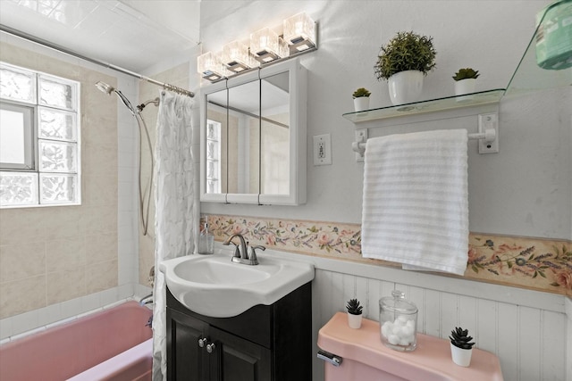 6449 W 84th St, Burbank, IL 60459 - bathroom with vanity, shower / tub combo with curtain, and a wainscoted wall