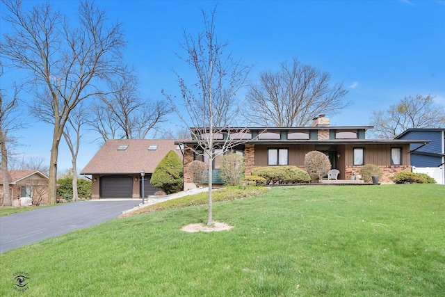 145 Markev Ln, New Lenox, IL 60451 - view of front of property featuring an attached garage, driveway, a chimney, and a front lawn
