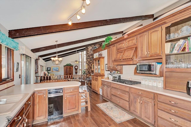 145 Markev Ln, New Lenox, IL 60451 - kitchen featuring lofted ceiling with beams, stainless steel appliances, a chandelier, wood finished floors, and light countertops