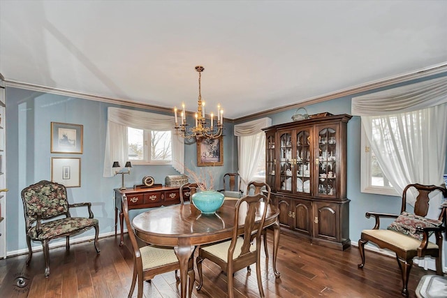 145 Markev Ln, New Lenox, IL 60451 - dining space featuring baseboards, crown molding, a chandelier, and dark wood-style floors
