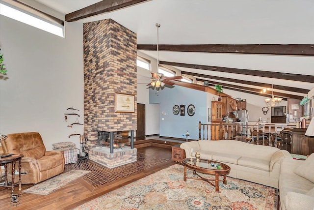 145 Markev Ln, New Lenox, IL 60451 - living area with a fireplace, wood finished floors, beam ceiling, and a ceiling fan