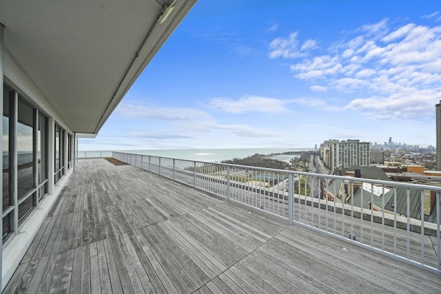 wooden terrace with a view of city
