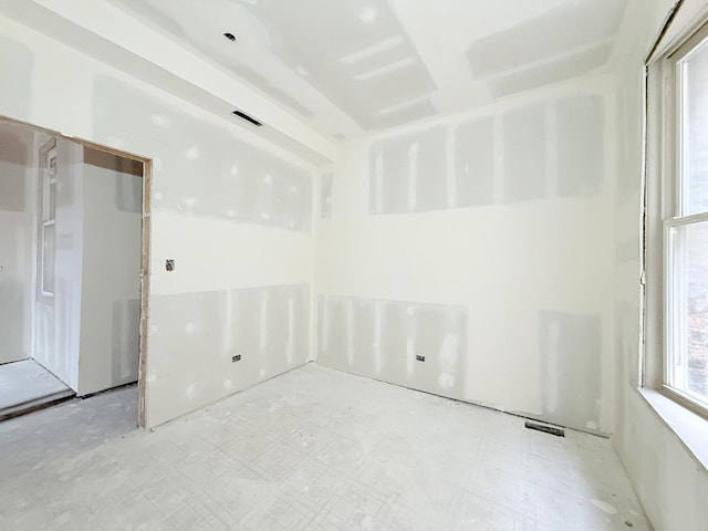 spare room with visible vents