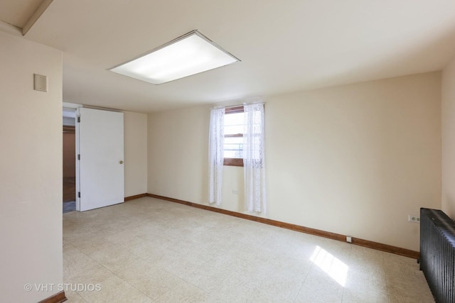 16224 Kedzie Ave, Markham, IL 60428 - spare room with radiator and light flooring
