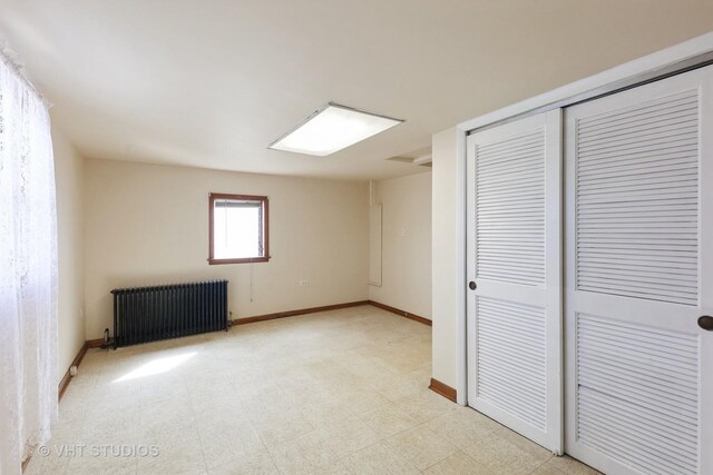 16224 Kedzie Ave, Markham, IL 60428 - unfurnished bedroom with radiator and a closet