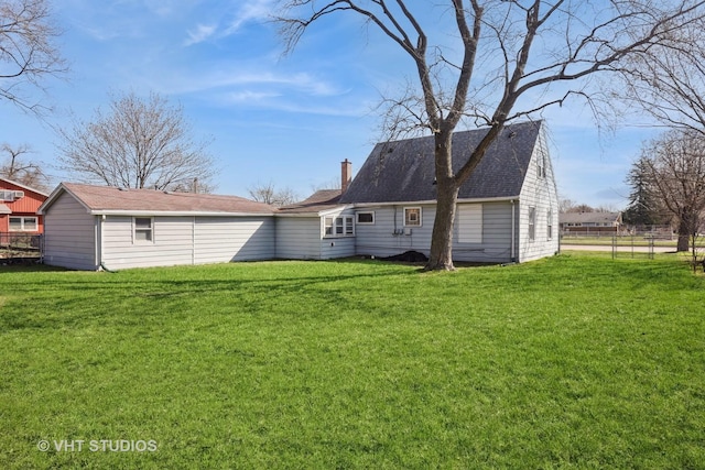 16224 Kedzie Ave, Markham, IL 60428 - rear view of house featuring a chimney and roof with shingles