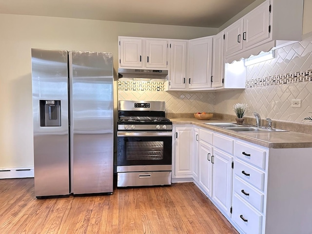 16224 Kedzie Ave, Markham, IL 60428 - kitchen featuring stainless steel appliances, under cabinet range hood, white cabinets, and tasteful backsplash