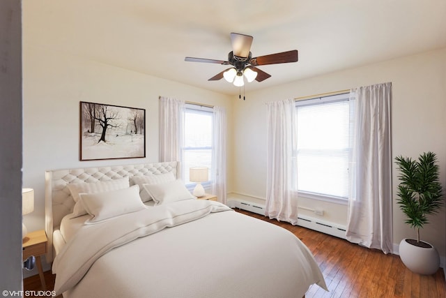 16224 Kedzie Ave, Markham, IL 60428 - bedroom featuring hardwood / wood-style floors, a baseboard radiator, and ceiling fan