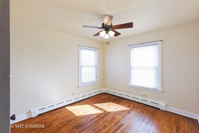 16224 Kedzie Ave, Markham, IL 60428 - empty room with hardwood / wood-style flooring, a baseboard radiator, a ceiling fan, and a baseboard heating unit