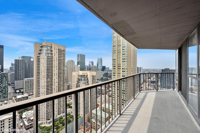 balcony featuring a city view