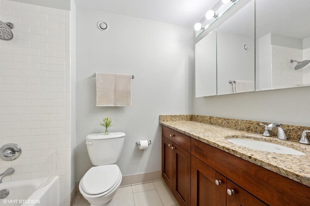 bathroom with tile patterned floors, baseboards, vanity, toilet, and  shower combination