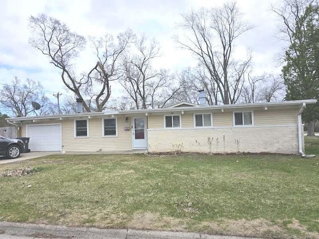 2301 Hermon Ave, Zion, IL 60099 - single story home featuring a front yard, a chimney, and an attached garage