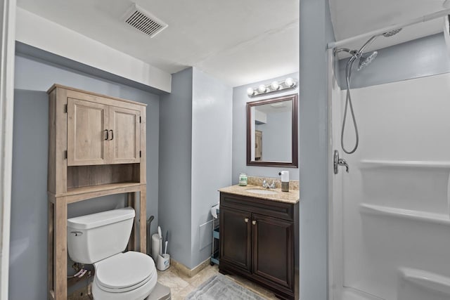 full bathroom with vanity, baseboards, toilet, visible vents, and a shower