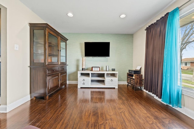 living room with baseboards, dark wood-style floors, and recessed lighting