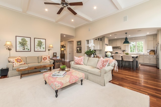 4529 Washington St, Downers Grove, IL 60515 - living area with a high ceiling, a ceiling fan, dark wood-type flooring, visible vents, and arched walkways