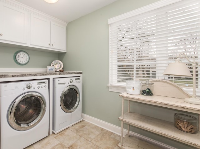 4529 Washington St, Downers Grove, IL 60515 - laundry room with cabinet space, light tile patterned floors, washing machine and clothes dryer, and baseboards