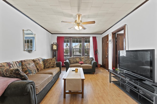 1913 N Kildare Ave, Chicago, IL 60639 - living area featuring light wood-style flooring, ceiling fan, and ornamental molding