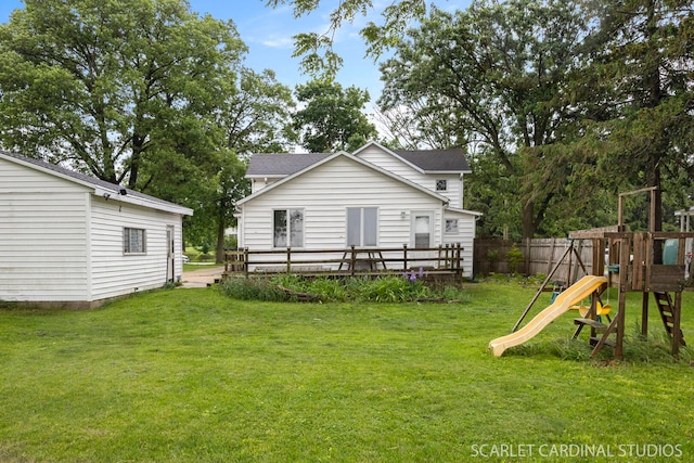 301 S Shabbona Rd, Shabbona, IL 60550 - view of yard with a playground and a wooden deck