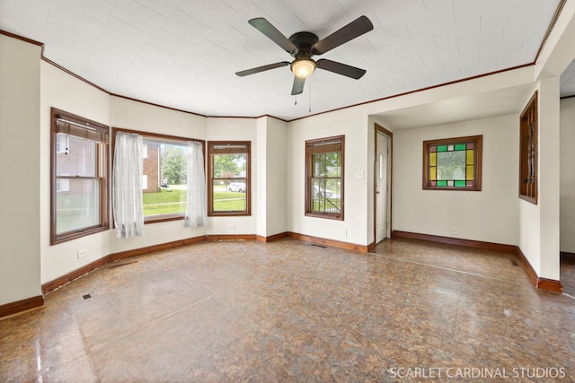 301 S Shabbona Rd, Shabbona, IL 60550 - empty room featuring baseboards, healthy amount of natural light, a ceiling fan, and crown molding