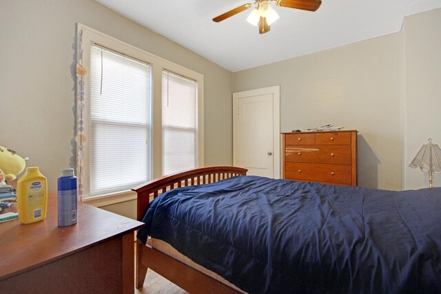 18241 Roy St, Lansing, IL 60438 - bedroom featuring wood finished floors and a ceiling fan
