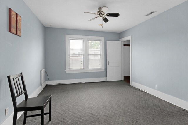 18241 Roy St, Lansing, IL 60438 - carpeted spare room featuring ceiling fan and baseboards