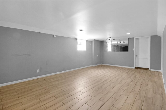 18241 Roy St, Lansing, IL 60438 - basement featuring light wood-type flooring and baseboards