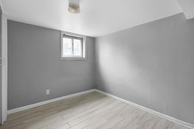18241 Roy St, Lansing, IL 60438 - empty room featuring wood finished floors and baseboards