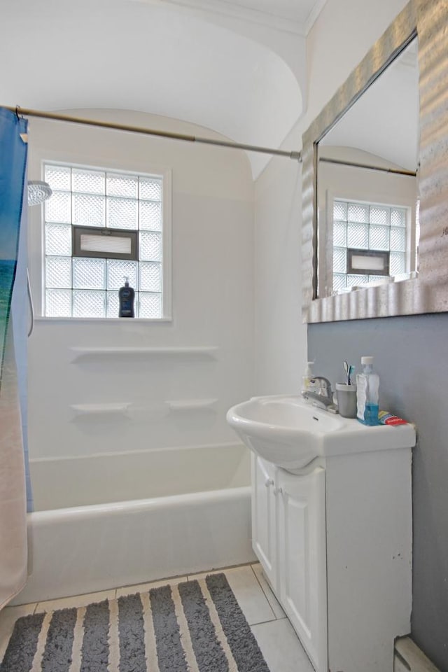18241 Roy St, Lansing, IL 60438 - bathroom with vanity, shower / tub combo with curtain, plenty of natural light, and tile patterned floors