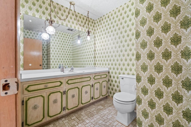 7415 W Ute Ln, Palos Heights, IL 60463 - bathroom with wallpapered walls and vanity