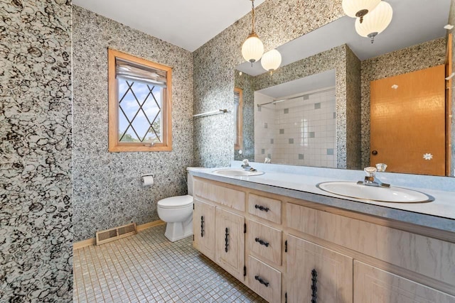 7415 W Ute Ln, Palos Heights, IL 60463 - bathroom with double vanity, tiled shower, and tile patterned flooring