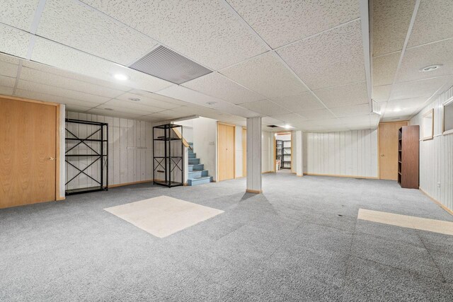 7415 W Ute Ln, Palos Heights, IL 60463 - finished basement with stairway, carpet flooring, a paneled ceiling, and wooden walls