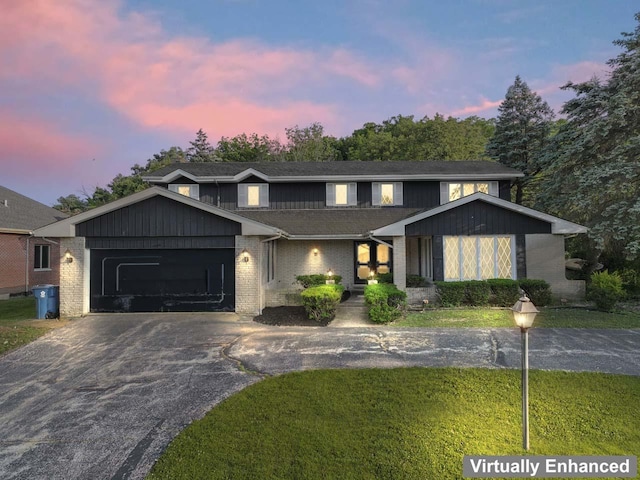 7415 W Ute Ln, Palos Heights, IL 60463 - view of front of property with asphalt driveway, an attached garage, a lawn, and brick siding