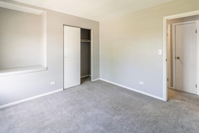 1437 S Busse Rd, Mount Prospect, IL 60056 - unfurnished bedroom featuring carpet floors, baseboards, and a closet