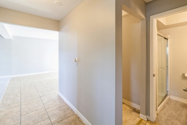 1437 S Busse Rd, Mount Prospect, IL 60056 - hallway with light tile patterned floors and baseboards