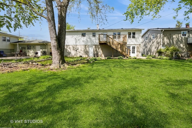 1437 S Busse Rd, Mount Prospect, IL 60056 - back of house with stairs and a wooden deck