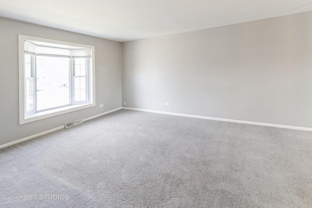 1437 S Busse Rd, Mount Prospect, IL 60056 - carpeted empty room featuring baseboards