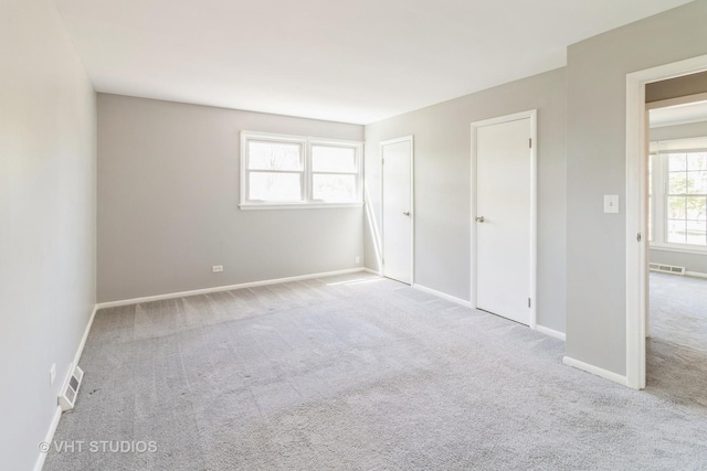 1437 S Busse Rd, Mount Prospect, IL 60056 - unfurnished bedroom with carpet flooring and baseboards