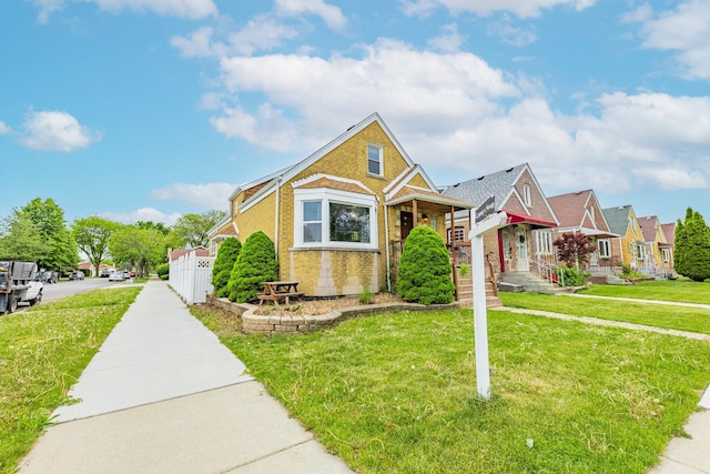 3801 W 65th Pl, Chicago, IL 60629 - bungalow with brick siding and a residential view