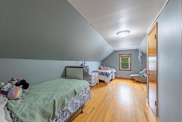3801 W 65th Pl, Chicago, IL 60629 - bedroom with light wood-style flooring and lofted ceiling