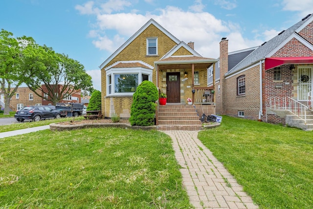 3801 W 65th Pl, Chicago, IL 60629 - view of front of house featuring brick siding and a front yard