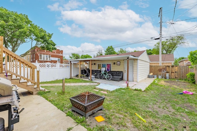3801 W 65th Pl, Chicago, IL 60629 - view of yard with an outdoor fire pit and a patio