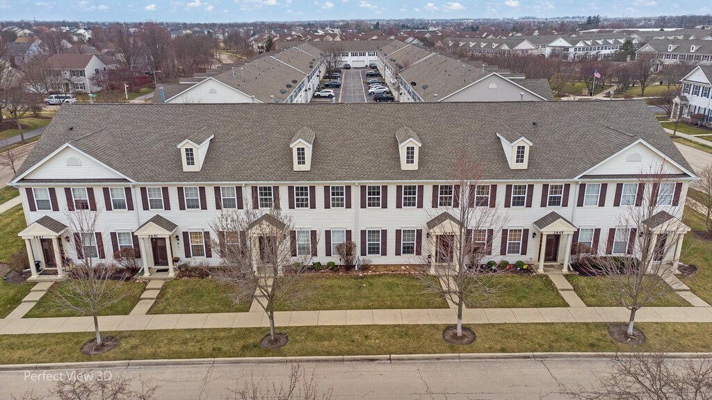 2649 Hillsboro Blvd, Aurora, IL 60503 - view of front facade featuring a front lawn, roof with shingles, and a residential view