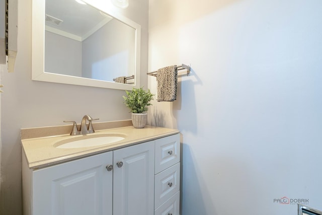 bathroom with visible vents and vanity