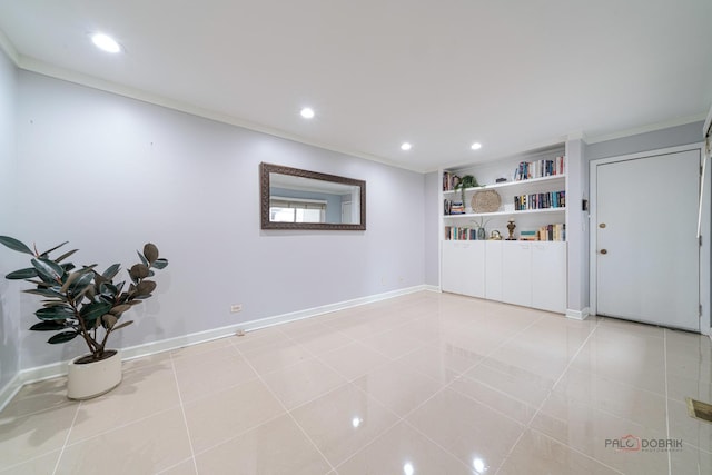 empty room with baseboards, crown molding, recessed lighting, and light tile patterned floors