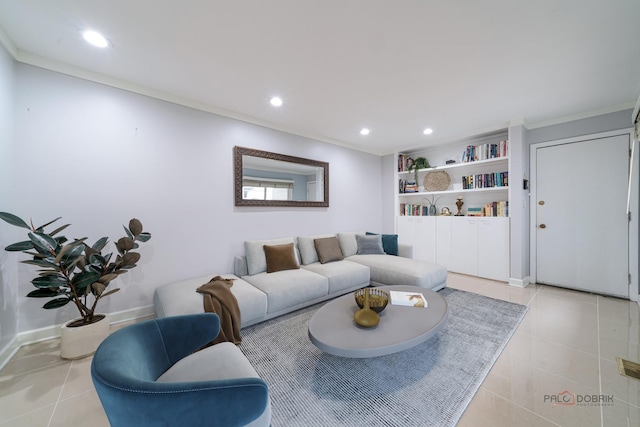 living area with tile patterned floors, crown molding, and recessed lighting