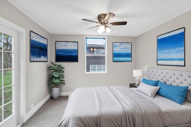 bedroom with baseboards, a ceiling fan, and carpet